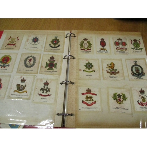 21 - Collection in stock books, loose and paper albums including Wix Kensitas flags, flowers, medals, oth... 