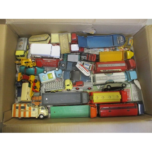 243 - Unboxed accumulation of die cast cars, buses, lorries, construction vehicles, etc, generally good to... 