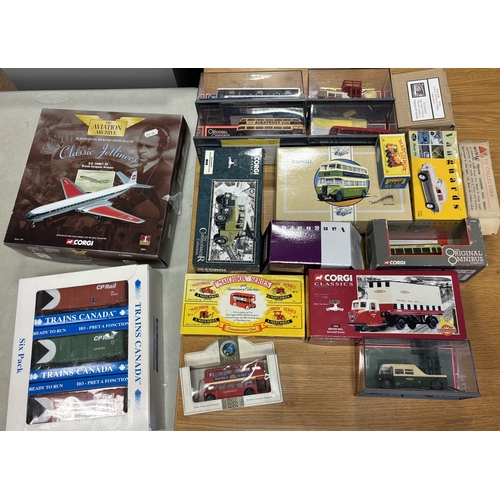 283 - Collection of boxed and unboxed 1:43 scale model vehicles, with mostly buses, including unboxed Corg... 