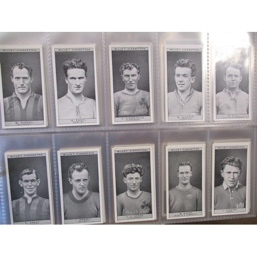 29 - Collection in 2 albums and sleeves including trade cards Typhoo Tea Football cards (21), Topical Tim... 