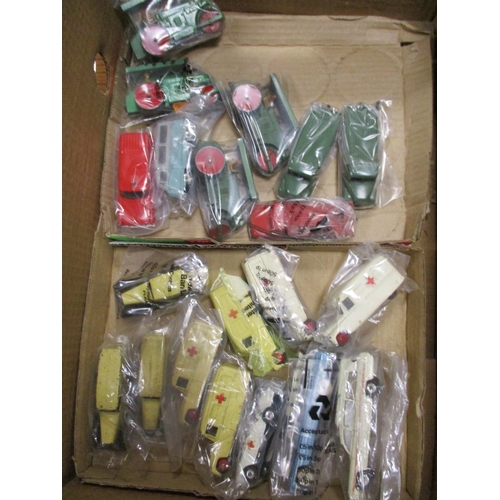 348 - Dinky. Unboxed collection with ambulances, buses, cars, military vehicles, trucks etc some play worn... 