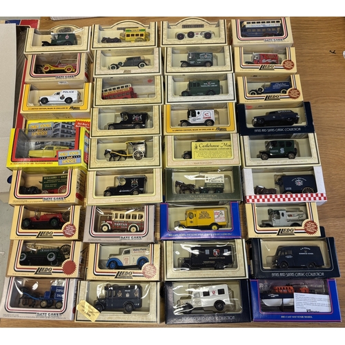 374 - Lledo. Collection of 1:43 scale model cars, generally excellent in excellent boxes, including vans, ... 