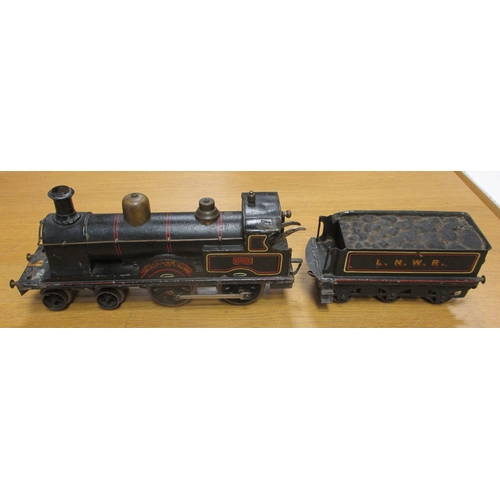 428 - Bing. Gauge 1 LNWR 1902 'Jupiter' black 4-4-0 clockwork locomotive and tender (With key), red/gold t... 