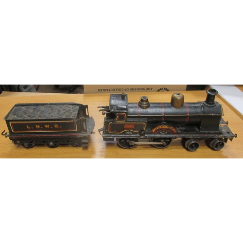 428 - Bing. Gauge 1 LNWR 1902 'Jupiter' black 4-4-0 clockwork locomotive and tender (With key), red/gold t... 