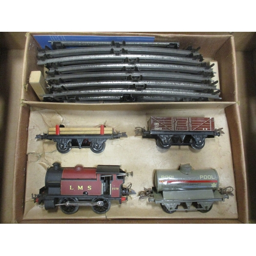 472 - Hornby. Pair of O gauge sets, generally very good plus to excellent in very good to excellent boxes,... 