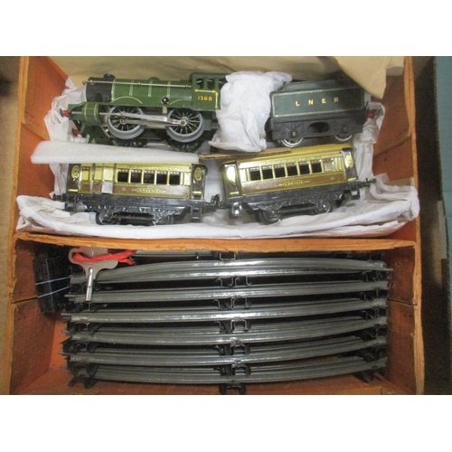 472 - Hornby. Pair of O gauge sets, generally very good plus to excellent in very good to excellent boxes,... 