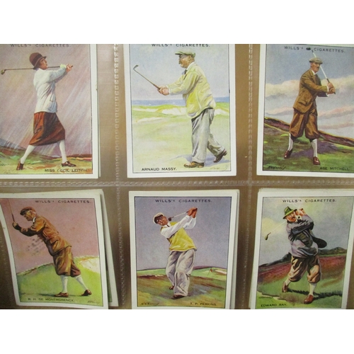 49 - Wills. Complete set in plastic sleeves with 1930 Famous Golfers generally good. Cat. £550. (See phot... 