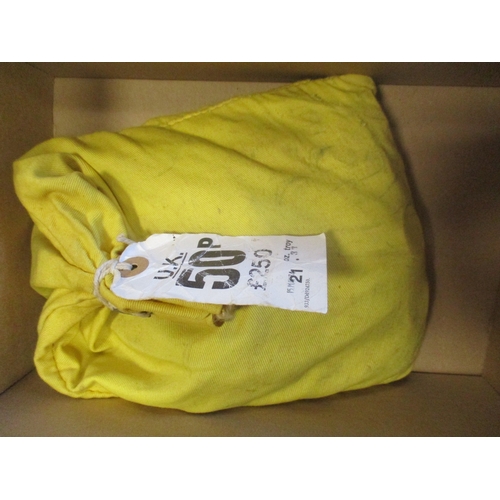 500 - Bank sealed yellow bag of 1973 EEC 50ps, white label with one side reading '50p - £250 - 21 oz. troy... 