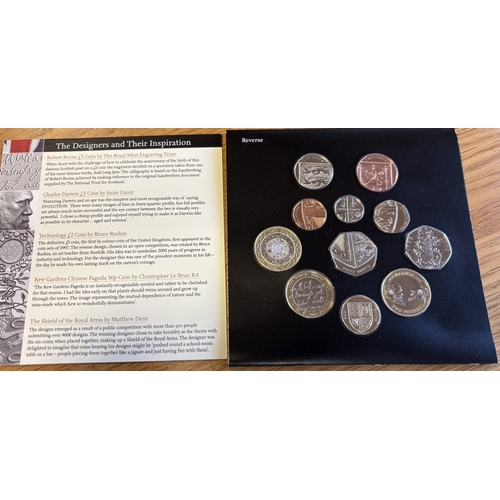 506 - 2009 uncirculated set by Royal Mint in card folder, including 50p Kew Gardens. (Y)