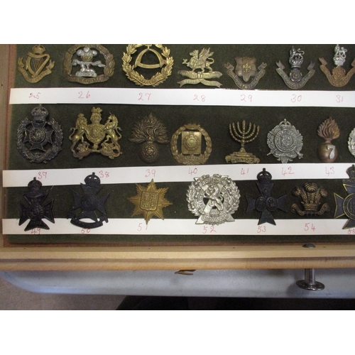 68 - Cap badge collection of mostly Infantry regiments mounted on foam in home made glass display draw, i... 