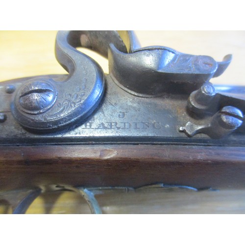 94 - Flintlock pistol, overall length approx. 21cm, stamped 'London' mid barrel with further inscription ... 