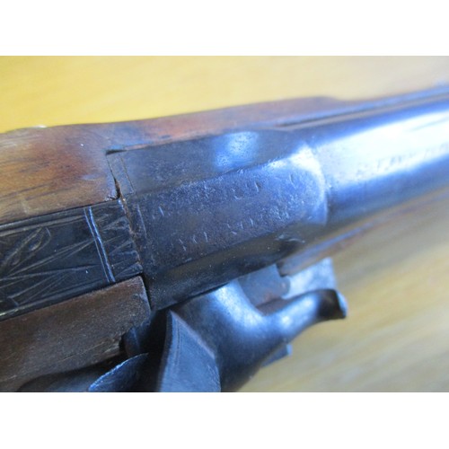 94 - Flintlock pistol, overall length approx. 21cm, stamped 'London' mid barrel with further inscription ... 