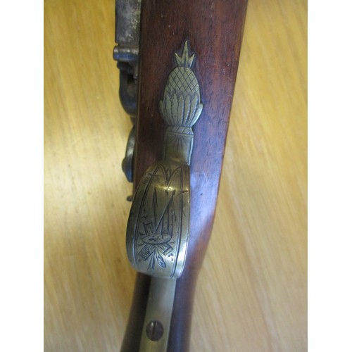 94 - Flintlock pistol, overall length approx. 21cm, stamped 'London' mid barrel with further inscription ... 