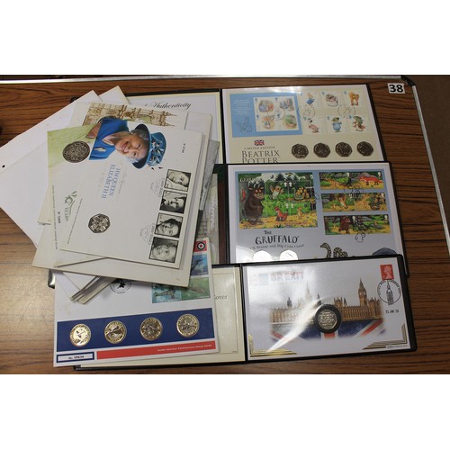 552 - Collection of uncirculated world coin covers in albums, folders and loose, includes Beatrix Potter, ... 