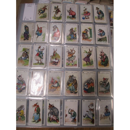 17 - Collection in plastic sleeves with complete sets including Churchman Cricketers, 