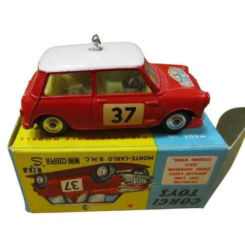 226 - Corgi. Collection with Mini Cooper 'S' ' Monte Carlo 1965' red body, white roof, yellow interior, RN... 