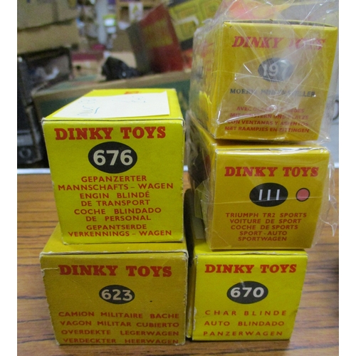 258 - Dinky. Collection of boxed military vehicles with army covered wagon No 623, armoured car No 670, ar... 