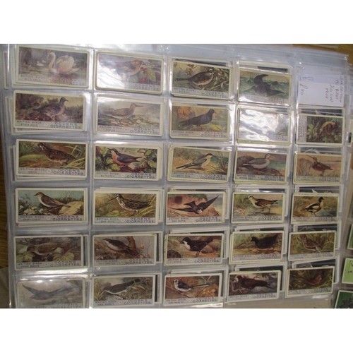 27 - Ogdens. Collection in album and plastic sleeves with complete sets including Boy Scouts, British Bir... 