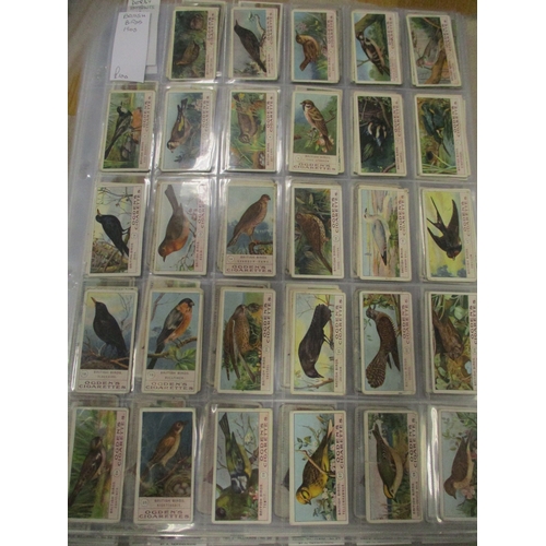 27 - Ogdens. Collection in album and plastic sleeves with complete sets including Boy Scouts, British Bir... 