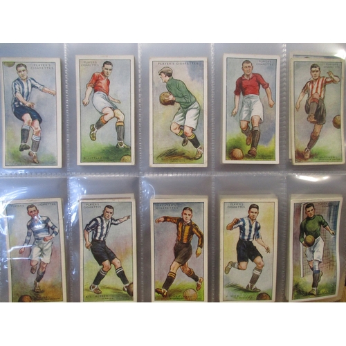 9 - Collection in albums, stock books and loose with complete sets including Players Cricketers 1934, Cr... 