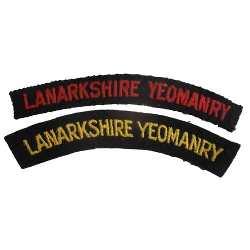 84 - Range of cloth shoulder titles, with:
1. Royal Devon Yeomanry cloth shoulder title, yellow embroider... 