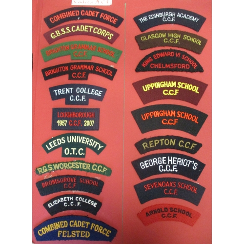 71 - Cloth shoulder title collection mounted on 5 boards with double sided tape, in a carrying case. Main... 