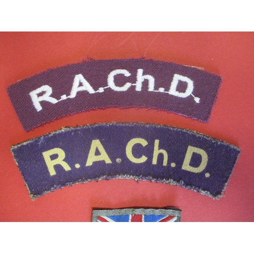 71 - Cloth shoulder title collection mounted on 5 boards with double sided tape, in a carrying case. Main... 