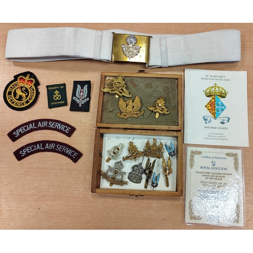 68A - Collection of cap badges consist of rifle/artillery regiments plus cloth shoulder titles and belt wi... 