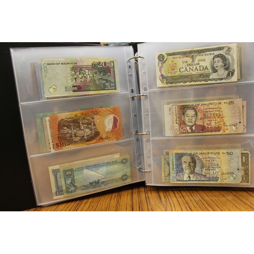 114 - Collection in albums with ranges from Argentina, Canada, India, Kenya, Norway, Malaysia, Paraguay, S... 