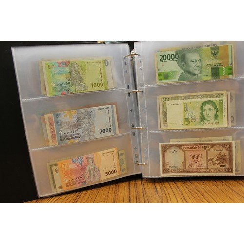 114 - Collection in albums with ranges from Argentina, Canada, India, Kenya, Norway, Malaysia, Paraguay, S... 