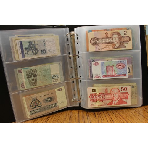 114 - Collection in albums with ranges from Argentina, Canada, India, Kenya, Norway, Malaysia, Paraguay, S... 