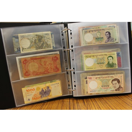 114 - Collection in albums with ranges from Argentina, Canada, India, Kenya, Norway, Malaysia, Paraguay, S... 