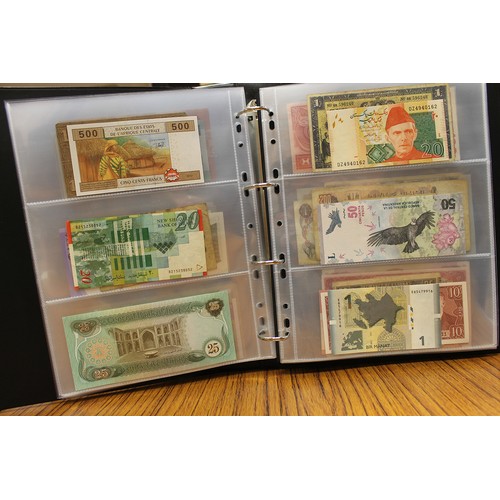 114 - Collection in albums with ranges from Argentina, Canada, India, Kenya, Norway, Malaysia, Paraguay, S... 