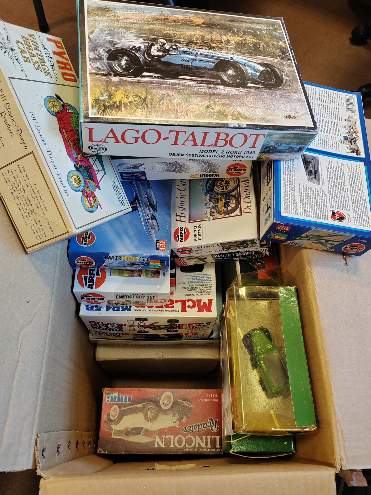 Collection of mostly unassembled kits model kits, appear complete with ...