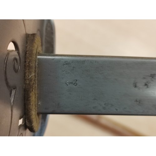 52 - 1897 Pattern infantry sword with leather scabbard, light pitting to blade, ricasso marked with crows... 