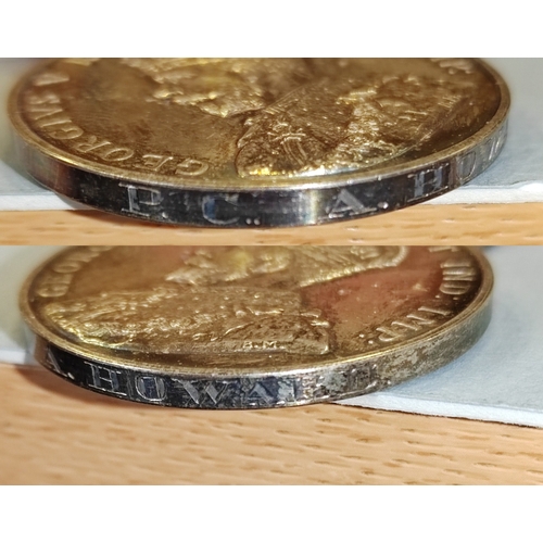 40 - Howard Family group:
1. Caterpillar Club badge, in gold with Ruby eyes, extremely fine, engraved to ... 