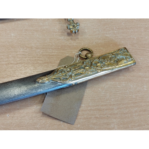 48 - Mameluke sword with metal scabbard, false edge, 80% of blade ornately etched, ricasso marked Moore &... 