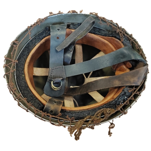 55 - Original British Airborne MK2 leather chinstrap helmet by BMB and dated 1943, size 7, some tears to ... 