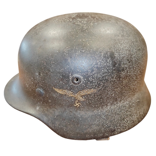 56 - WW2 German Army M-35 Pattern double decal steel combat helmet, complete with lining and strap, origi... 