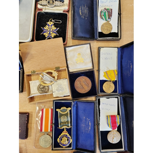 59 - Collection with various medals ranging from WWI to present, mostly British and USA, plus accumulatio... 