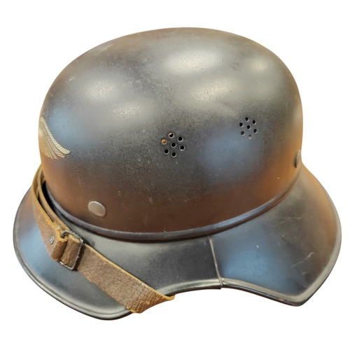 66 - WWII Luftschutz gladiator helmet complete with liner and chinstrap, well preserved front decal, rear... 