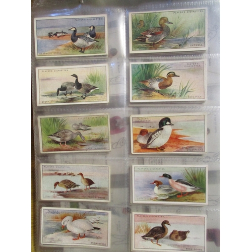 10 - Collection of mostly Players in 7 albums, plastic sleeves and loose with complete sets including Pla... 