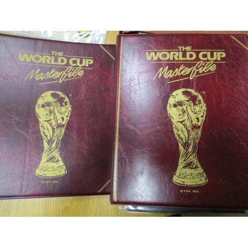 19 - Collection in albums and sleeves with Phillips silks including City Arms, Heraldic Series, Regimenta... 