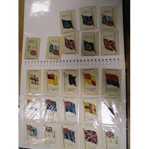 19 - Collection in albums and sleeves with Phillips silks including City Arms, Heraldic Series, Regimenta... 