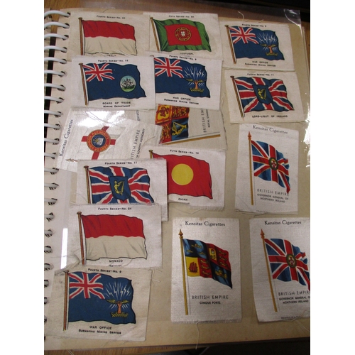 19 - Collection in albums and sleeves with Phillips silks including City Arms, Heraldic Series, Regimenta... 