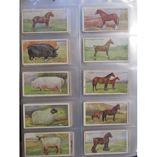 31 - Players. Collection in 5 albums with complete sets including Badges & Flags of British Regiments (nu... 