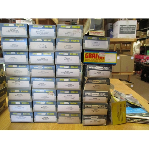 691 - Wrenn. Collection of boxed OO gauge with coaches (5) and wagons, including banana van, salt, ore, ve... 