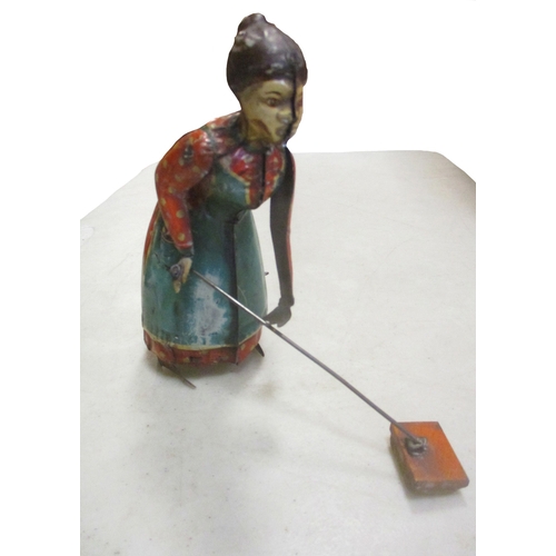 140 - Distler. 1920s German-made Busy Lizzie wind-up tin toy with sweeping action, good plus, tested and w... 
