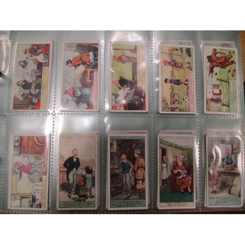 7 - Collection in 13 albums with part sets including ranges from Mitchell Humorous Drawings (45), Ogdens... 