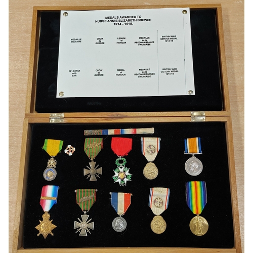 Medal group to Nurse Annie Elizabeth Brewer with Legion d'Honneur, Croix de Guerre (1914-1917 with oak leaf, 1914-1918 with oak leaf), Medal of French Gratitude type 1 (2), Médaille militaire (3rd Republic), Medal of Honour of Epidemics (reverse marked Miss Nancy Brewer 1918), 1914 Star Trio with clasp to Annie Elizabeth Brewer (BWM & Victory marked A.E. Brewer.), plus enamel pilgrims badge and ribbon bar with oak leaf, included copied MIC and citation, mixed condition, presented in padded wooden case.

Annie Elizabeth Brewer, mostly known as Nancy, born 21st November 1874. Aged 24 she qualified as a nurse for 'insane persons', working across many hospitals in Britain eventually ventured to France as a personal nurse. 
While in Paris war broke out and she joined the French nursing and ambulance services, the Fondation Baye, courageously serving in several infamous battles such as the Marne, Somme and Verdun, it is recorded she helped with 229 operations in 7 days at the battle of Verdun. Working so close to the frontlines Nancy was injured by enemy shellfire while treating a soldier in an ambulance resulting in wounds to her head and leg, this led to serious strain and illness for a period of time but valiantly insisted on returning to duty once recovered. A lighter note, on the Verdun battlefield she married French Ambulance driver Daniel Mistrick and after the war decided to remain in Europe only returning home to Newport to nurse her ailing mother, but herself was seriously ill from Bright's disease, sadly passing on 30th January 1921 aged 46. Nancy is buried at Saint Woolos Cemetery, however there is a campaign to add Nancy to The Commonwealth War Graves register, in 2014 the BBC also aired a documentary called "Annie's War: A Welsh Nurse on the Western Front" and since been awarded a Blue Plaque on West Street in her home city. (B)